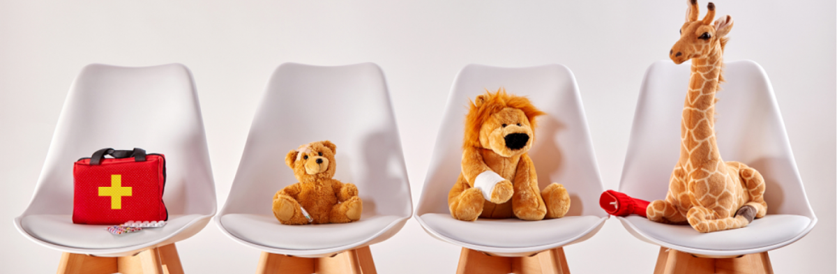 stuffed animals in chairs